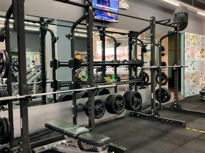 A stopwatch on a gym bench showing workout time.